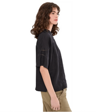 Load image into Gallery viewer, Black linen top with delicate cutout texture details, side view