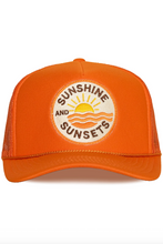 Load image into Gallery viewer, Orange cap with 'Sunshine and Sunsets' logo on a white background