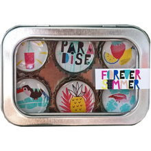 Load image into Gallery viewer, A silver metal tin containing six round bottle-cap-style magnets with tropical and beach-themed designs, including a pineapple, strawberry, flamingo, toucan, palm leaves, and the words 'PARADISE' and 'FOREVER SUMMER'.