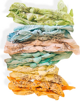 Load image into Gallery viewer, Stack of crumpled bandanas in various shades of sun bleached colors

