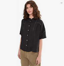 Load image into Gallery viewer, Black linen top with delicate cutout texture details, front view
