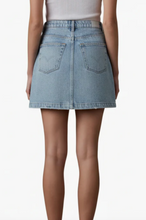 Load image into Gallery viewer, Back view of a woman wearing light wash denim skirt
