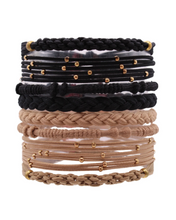 Load image into Gallery viewer, A stack of ten woven and braided stretch bracelets in black and tan, accented with small gold-tone beads and caps, displayed on a clean white background.
