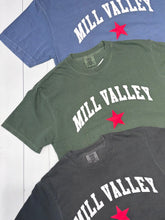 Load image into Gallery viewer, Tee shirts that read 'Mill Valley' in white text with a red star 
