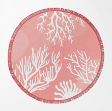 Load image into Gallery viewer, A round beach towel or blanket with a coral print, featuring a dusty pink background and white coral silhouettes, finished with a fringed edge.

