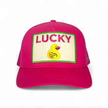 Load image into Gallery viewer, Pink cap with 'Lucky' and duck graphic on a white background
