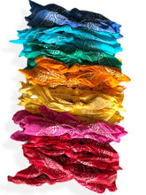 Load image into Gallery viewer, Stack of colorful bandanas paper in various shades on a white background
